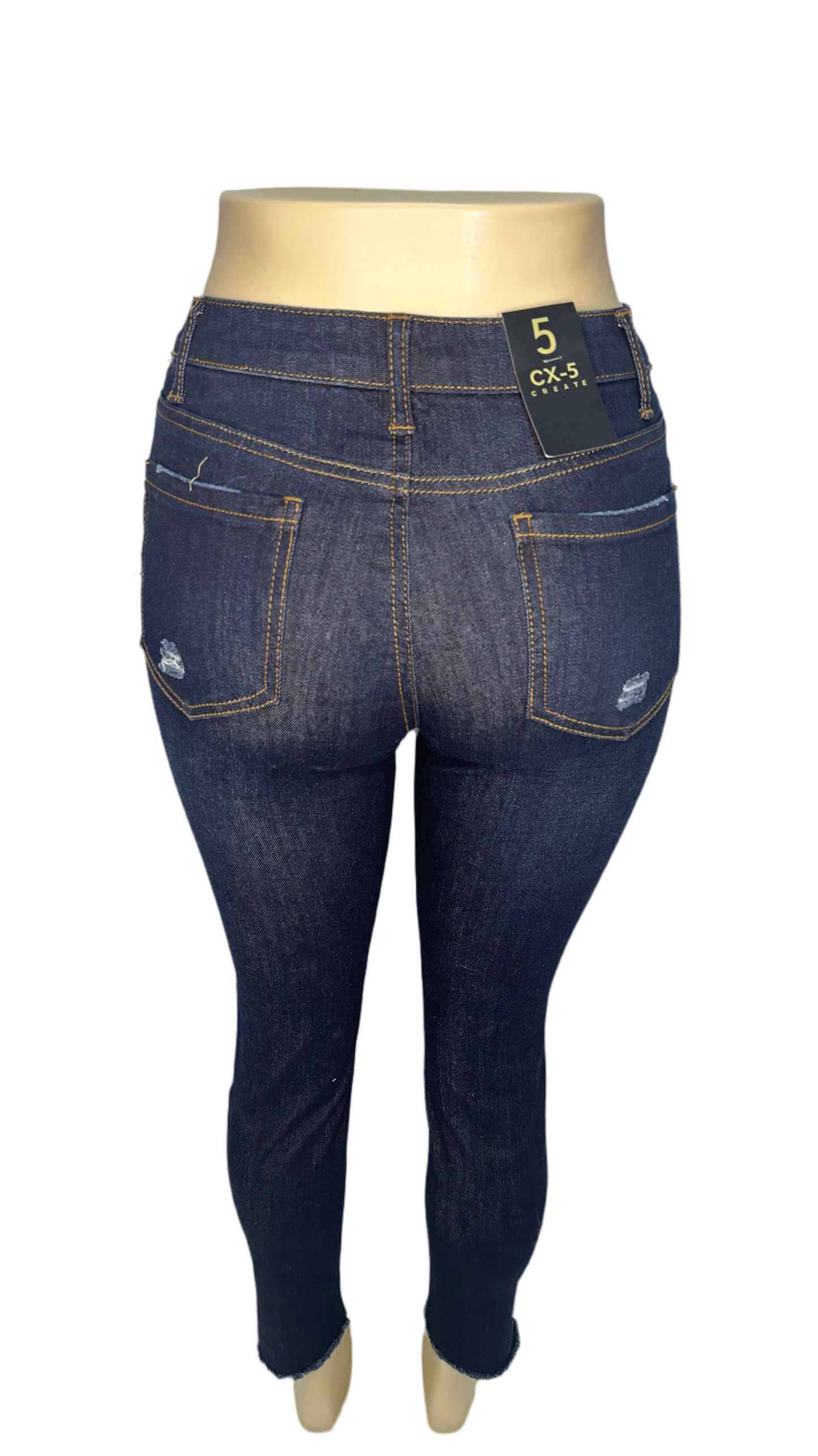 Distressed, dark blue skinny jeans 