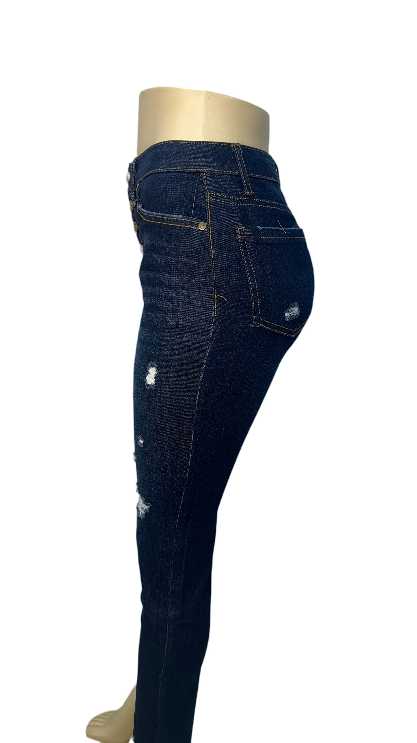 Distressed, dark blue skinny jeans 