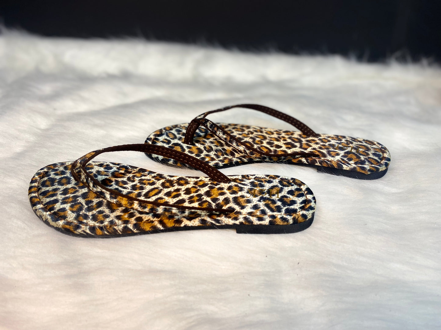 Leopard flip flops