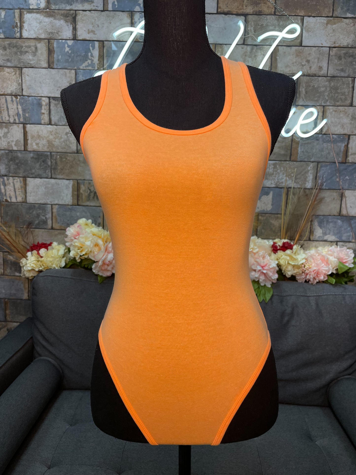 Orange bodysuit