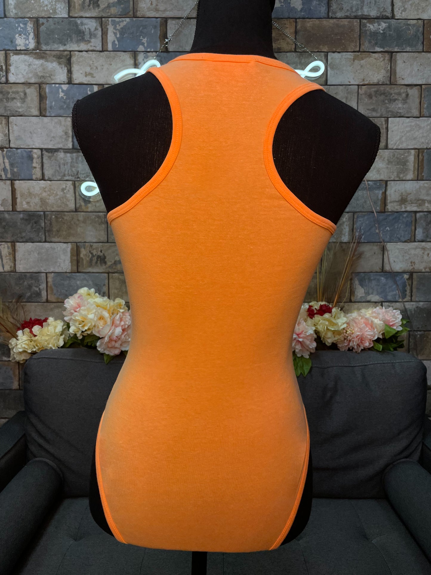Orange bodysuit